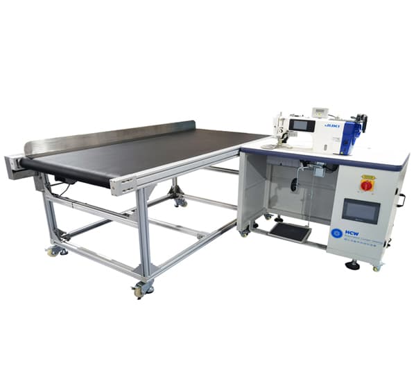 HCW USA sewing head integrated with a fabric conveyor table